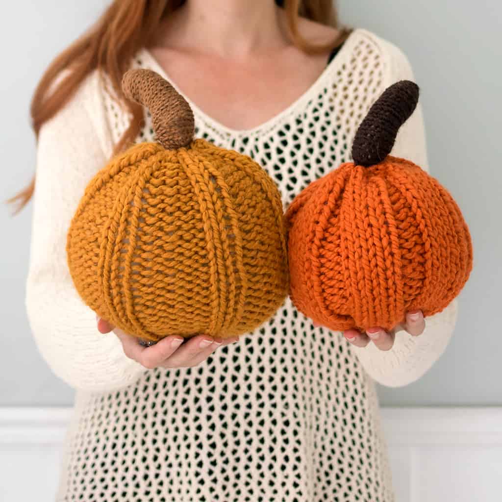 Two large knitted pumpkins