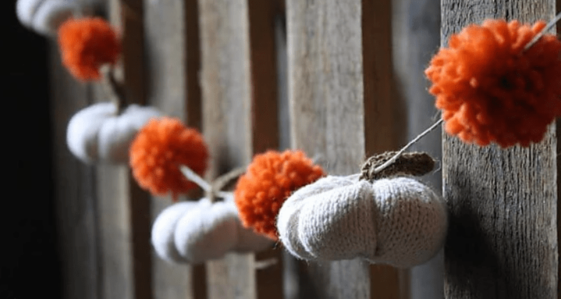 knitted pumpkin and pompom garland