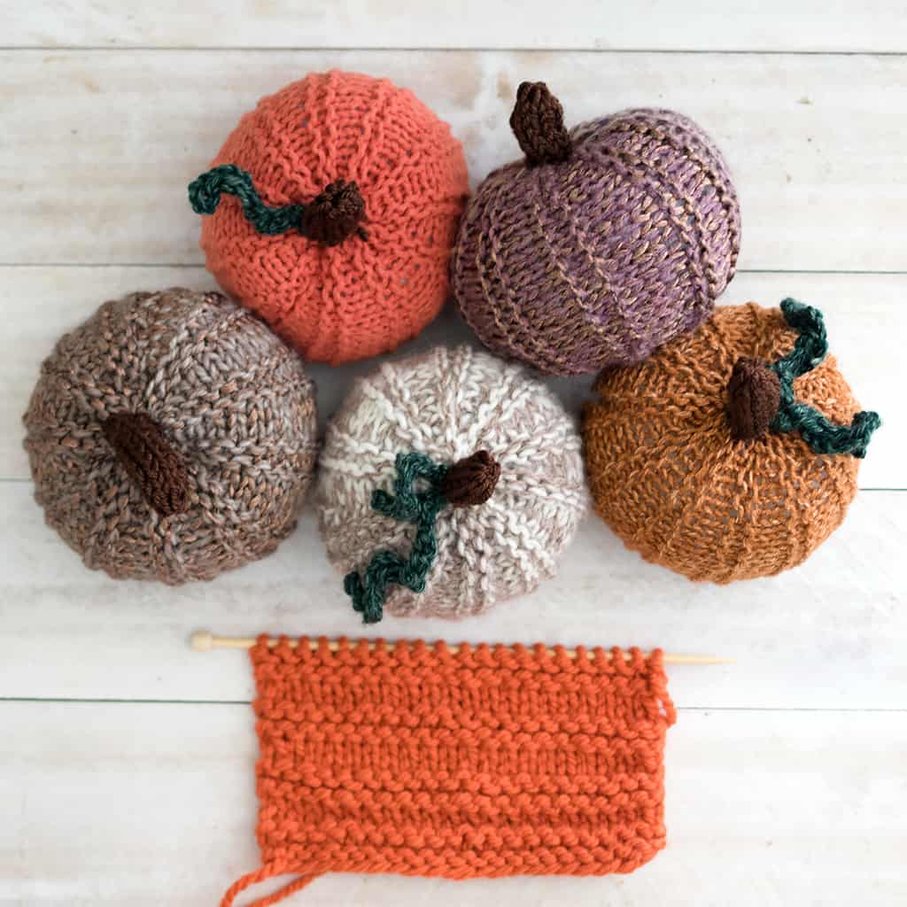 Five small knitted pumpkins