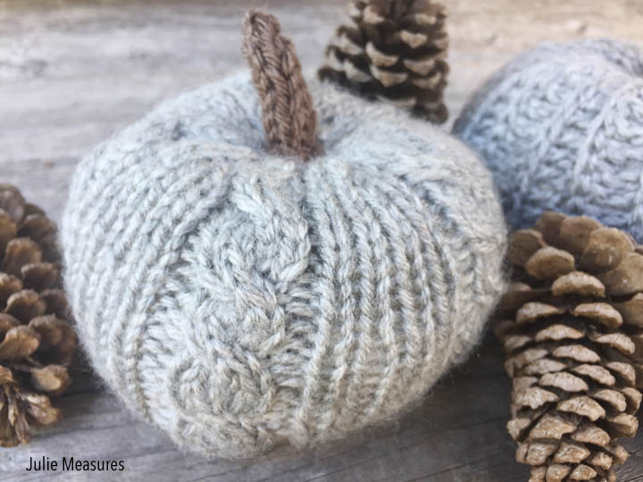 Grey knitted pumpkin with cable design